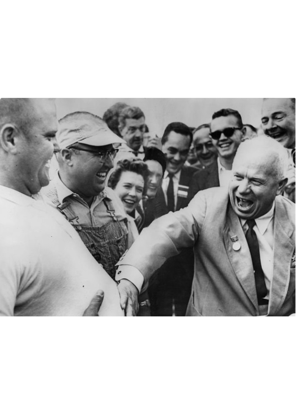 Krushchev touching farmer's stomach